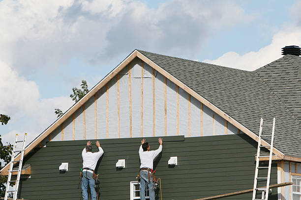 Professional Siding technician working in Cameron, OH